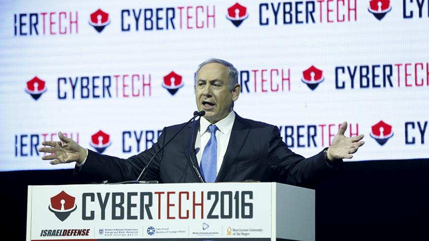 Israeli Prime Minister Benjamin Netanyahu gestures as he speaks at the Cybertech 2016 conference in Tel Aviv, Israel January 26, 2016. REUTERS/Baz Ratner - RTX242M5