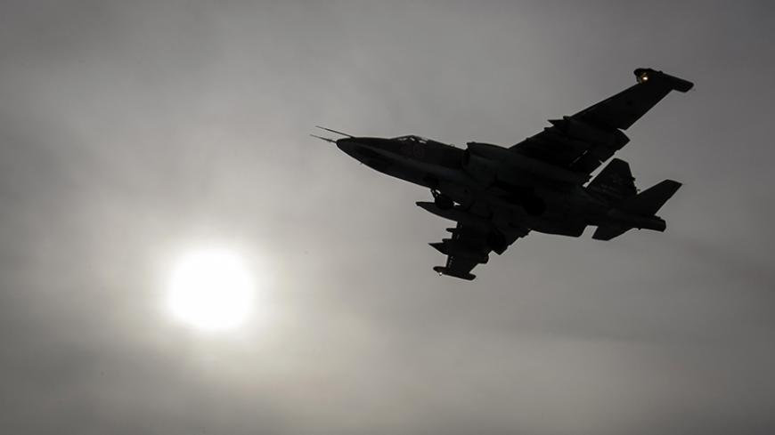 A Sukhoi Su-25 jet fighter flies during a drill at the Russian southern Stavropol region, March 12, 2015.  Russia has started military exercises in the country's south, as well as in Georgia's breakaway regions of South Ossetia and Abkhazia and in Crimea, annexed from Ukraine last year, news agency RIA reported on Thursday, citing Russia's Defence Ministry.  REUTERS/Eduard Korniyenko  (RUSSIA - Tags: POLITICS CIVIL UNREST MILITARY) - RTR4T448