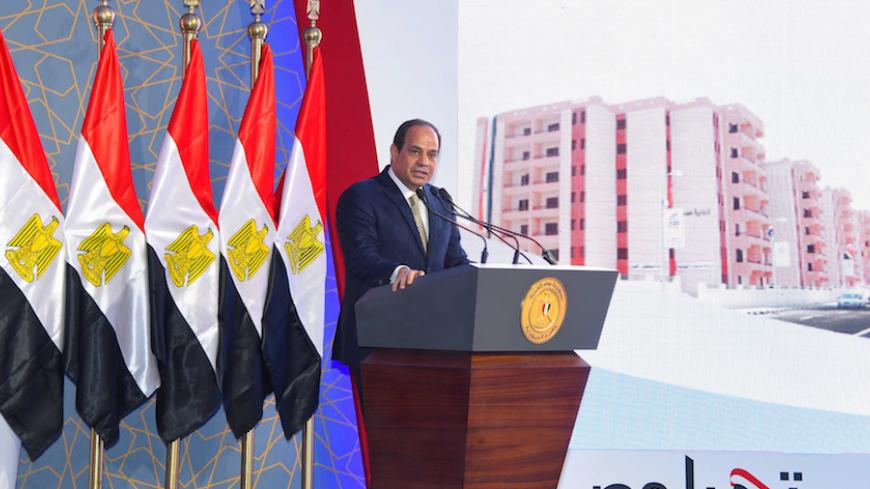 Egyptian President Abdel Fattah al-Sisi speaks during the opening of the first and second phases of the housing project "Long Live Egypt", which focuses on development in the country's slums, at Al-Asmarat district in Al Mokattam area, east of Cairo, Egypt May 30, 2016 in this handout picture courtesy of the Egyptian Presidency. The Egyptian Presidency/Handout via REUTERS ATTENTION EDITORS - THIS IMAGE WAS PROVIDED BY A THIRD PARTY. EDITORIAL USE ONLY. - RTX2ETMH
