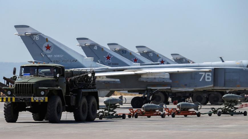 Russian military jets are seen at Hmeymim air base in Syria, June 18, 2016. Picture taken June 18, 2016. REUTERS/Vadim Savitsky/Russian Defense Ministry via Reuters ATTENTION EDITORS - THIS IMAGE WAS PROVIDED BY A THIRD PARTY. EDITORIAL USE ONLY. - RTX2H2BC