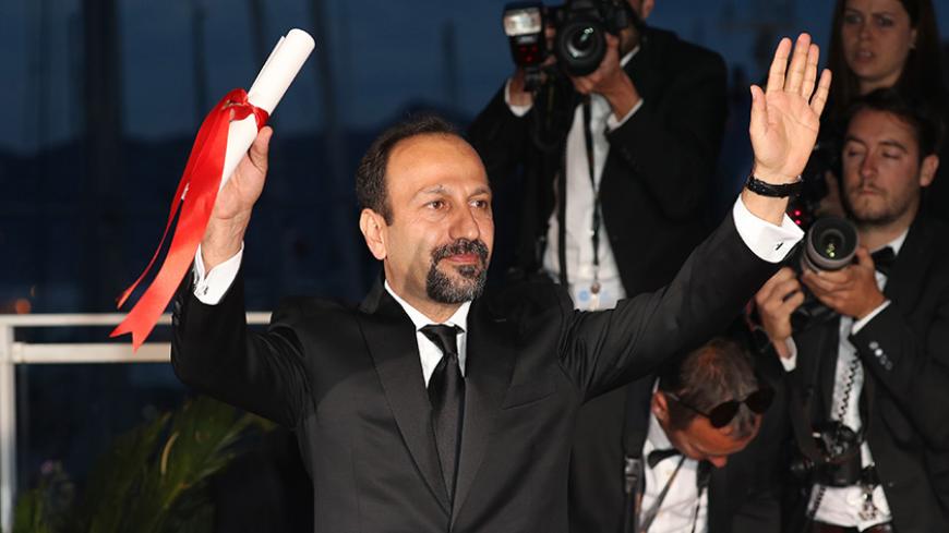 CANNES, FRANCE - MAY 22:  Director Asghar Farhadi poses with his award for the Best Screenplay for the movie 'The Salesman (Forushande)' during the Palme D'Or Winner Photocall during the 69th annual Cannes Film Festival at the Palais des Festivals on May 22, 2016 in Cannes, France.  (Photo by Andreas Rentz/Getty Images)