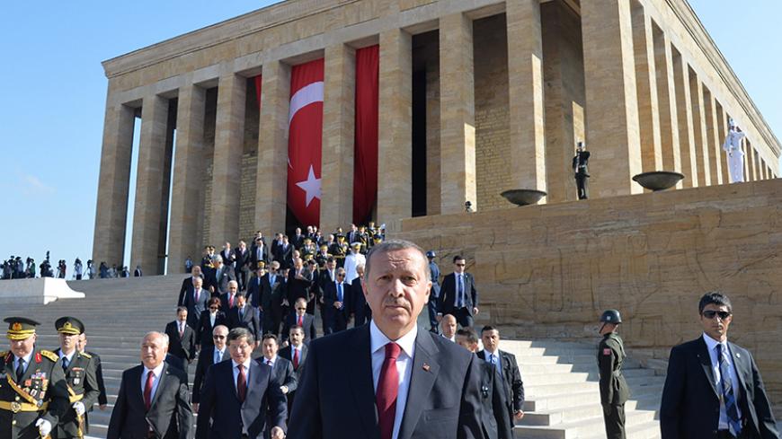 Turkey's President Tayyip Erdogan (C) attends a ceremony marking the 92nd anniversary of Victory Day at Anitkabir, mausoleum of modern Turkey's founder Ataturk, in Ankara August 30, 2014. REUTERS/Stringer (TURKEY  - Tags: POLITICS ANNIVERSARY MILITARY) - RTR44B5W