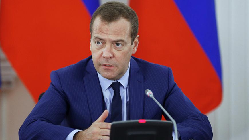 Russian Prime Minister Dmitry Medvedev chairs a meeting on social and economic development of regions in Pskov, Russia, August 16, 2016. REUTERS/Dmitry Astakhov/Sputnik/Pool - ATTENTION EDITORS - THIS IMAGE WAS PROVIDED BY A THIRD PARTY. EDITORIAL USE ONLY. - RTX2L9WK