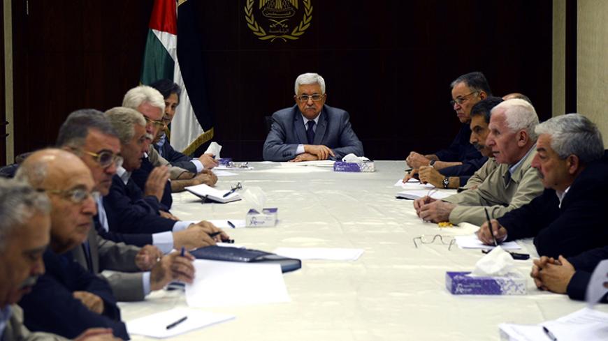 RAMALLAH, WEST BANK - JULY 13:  In this handout photo provided by the Palestinian Press Office (PPO), Palestinian President Mahmoud Abbas (C) meets with the Central Committee of the Fatah movement July 13, 2014 in Ramallah, West Bank. The total number of Palestinians killed by Israeli airstrikes on the Gaza Strip since Monday has reached 166, according to a Palestinian Health Ministry official.  (Photo by Thaer Ghanaim/PPO via Getty Images)
