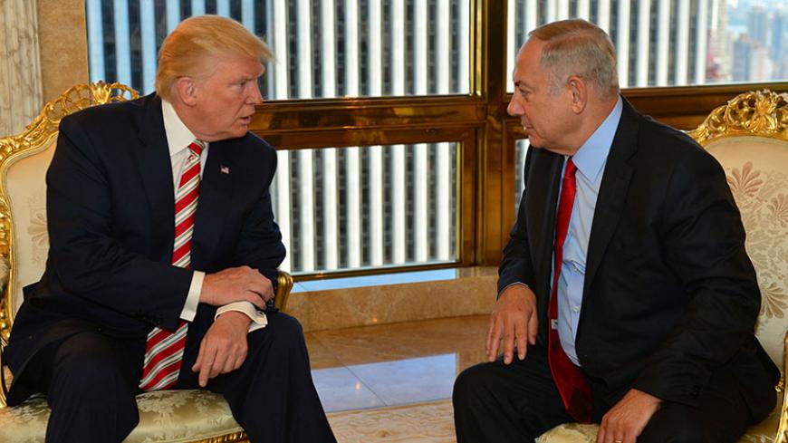 Israeli Prime Minister Benjamin Netanyahu (R) speaks to Republican U.S. presidential candidate Donald Trump during their meeting in New York, September 25, 2016. Kobi Gideon/Government Press Office (GPO)/Handout via REUTERS       ATTENTION EDITORS - THIS IMAGE HAS BEEN SUPPLIED BY A THIRD PARTY. FOR EDITORIAL USE ONLY. - RTX2SIOS