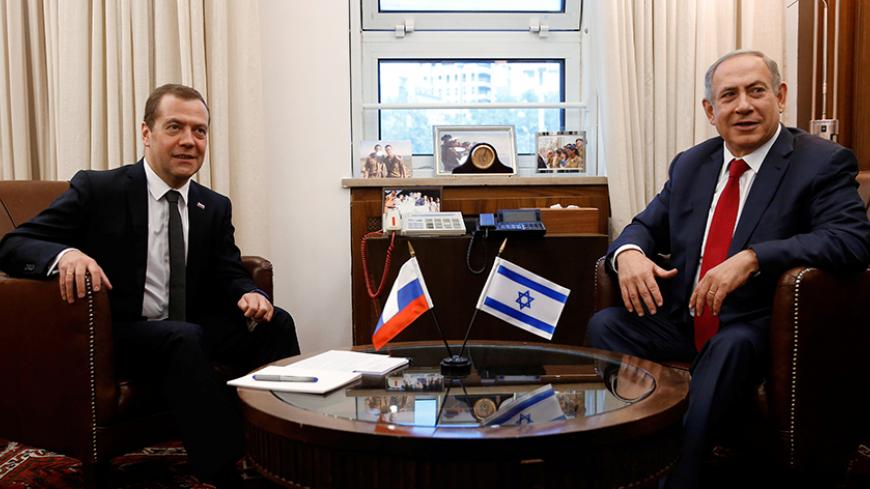 Russian Prime Minister Dmitry Medvedev (L) meets with Israeli Prime Minister Benjamin Netanyahu in Jerusalem, Israel, November 10, 2016. Sputnik/Pool/Dmitry Astakhov/via REUTERS ATTENTION EDITORS - THIS IMAGE WAS PROVIDED BY A THIRD PARTY. EDITORIAL USE ONLY. - RTX2T1QJ