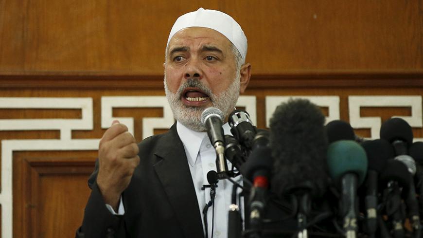 Hamas leader in Gaza Ismail Haniyeh delivers a sermon during Friday prayers in Gaza City October 9, 2015. Haniyeh called on Palestinians to step up their fight against Israel, describing the recent surge in violence in Jerusalem and the occupied West Bank as the beginning of a new uprising, or intifada. REUTERS/Mohammed Salem  - RTS3QIL