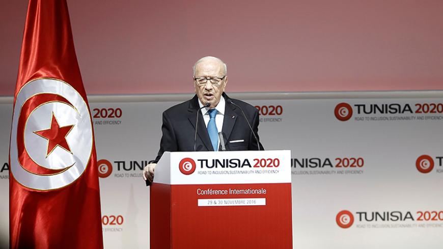 Tunisia's President Beji Caid Essebsi speaks during the opening of international investment conference Tunisia 2020, in Tunis, Tunisia November 29, 2016. REUTERS/Zoubeir Souissi - RTSTSIU