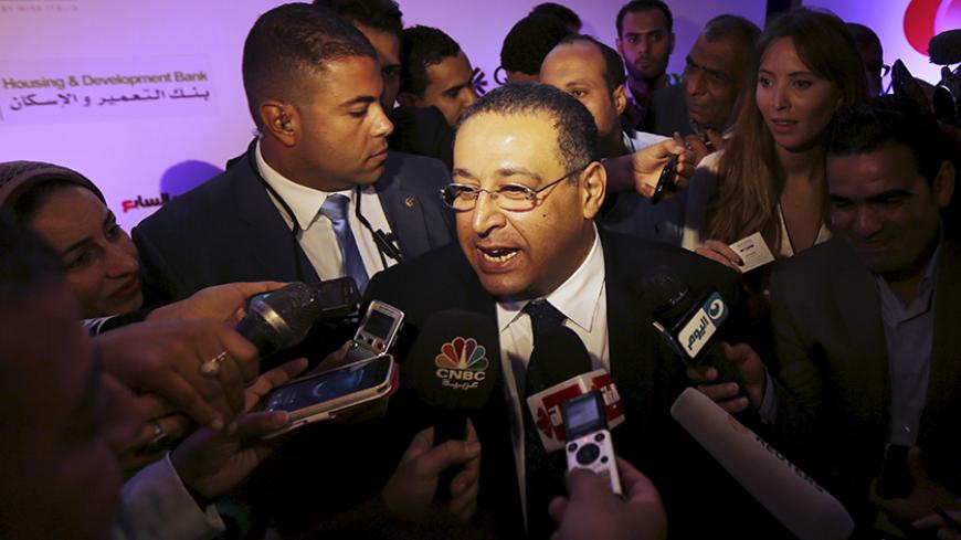 Egypt's Investment Minister Ashraf Salman talks to the media during the Euromoney Conference in Cairo, Egypt September 7, 2015. Egypt will return to the international bond market in the first half of 2016, the country's Finance Minister Hany Kadry Dimian said on Monday, taking advantage of its return to economic and political stability in the wake of the Arab Spring uprising of 2011. REUTERS/Mohamed Abd El Ghany - RTX1RG5Q