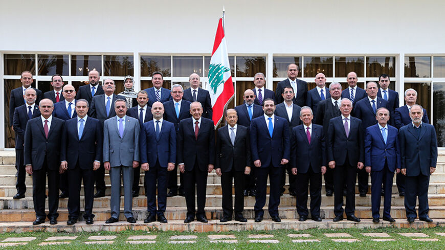 Members of the new Lebanese government pose for a picture at the presidential palace in Baabda, Lebanon December 21, 2016. The members are: (front row L-R) Finance Minister Ali Hassan Khalil, Minister of State for planning Michel Pharaon, Minister of Displaced Talal Erslan, VP and Minister of Public Health Ghassan Hasbani, Parliament Speaker Nabih Berri, President Michel Aoun, Prime minister Saad al-Hariri, Minister of Education Marwan Hamadeh, Minister of Agriculture Ghazi Zaaiter, Minister of State for Pa