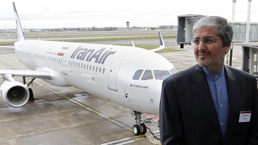 IranAir Chairman Farhad Parvaresh poses near an Airbus A321 painted in IranAir's livery as the company takes delivery of the first new Western jet under an international sanctions deal in Colomiers, near Toulouse, France, January 11, 2017 .   REUTERS/Regis Duvignau - RTX2YHMN
