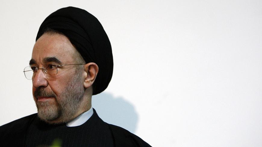 Former Iranian President Mohammad Khatami waits to make a keynote speech to an audience at a university in Melbourne March 26, 2009.  REUTERS/Mick Tsikas   (AUSTRALIA POLITICS) - RTXD85S