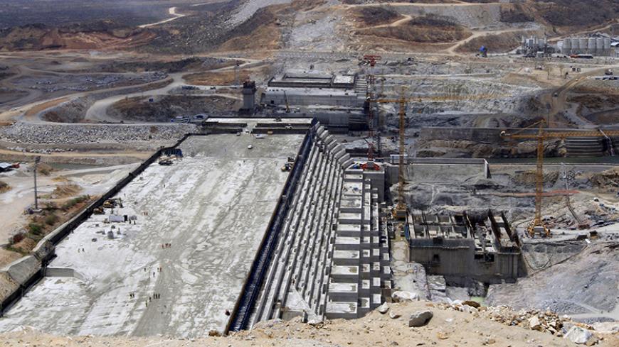 Ethiopia's Grand Renaissance Dam seen under construction during a media tour in Benishangul Gumuz Region, Guba Woreda, Ethiopia, in this March 31, 2015 file photo. REUTERS/Tiksa Negeri/Files - RTX2AAWN