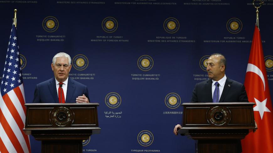 U.S. Secretary of State Rex Tillerson and Turkish Foreign Minister Mevlut Cavusoglu attend a news conference in Ankara, Turkey, March 30, 2017. REUTERS/Umit Bektas - RTX33DCF