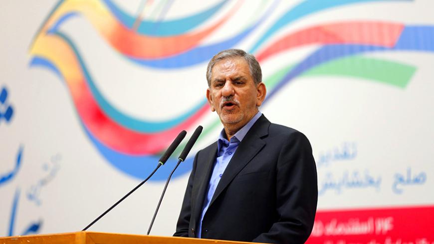 Iran's first Vice-President, Eshaq Jahangiri speaks during an annual ceremony in Tehran on March 14, 2017, in which charitable donors pay off the debts of mehrieh prisoners as a show of Islamic charity.
The "Mehrieh" ("affection") system, in which future husbands agree to pay a certain number of gold coins to the bride in the event of divorce, has left thousands of men in Iran languishing in jail and many more destitute. / AFP PHOTO / ATTA KENARE        (Photo credit should read ATTA KENARE/AFP/Getty Images