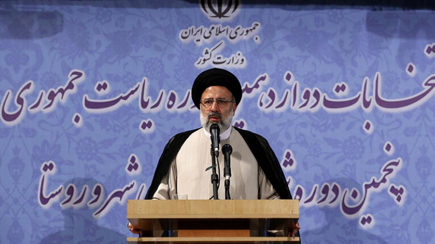 Iranian cleric and head of the Imam Reza charitable foundation, Ebrahim Raisi, delivers a speech after registering his candidacy for the upcoming presidential elections in the capital Tehran on April 14, 2017. / AFP PHOTO / ATTA KENARE        (Photo credit should read ATTA KENARE/AFP/Getty Images)