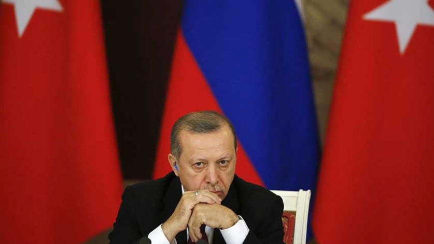 Turkish President Tayyip Erdogan attends a news conference after the talks with his Russian counterpart Vladimir Putin at the Kremlin in Moscow, Russia, March 10, 2017. REUTERS/Sergei Ilnitsky/Pool - RTS12BWW