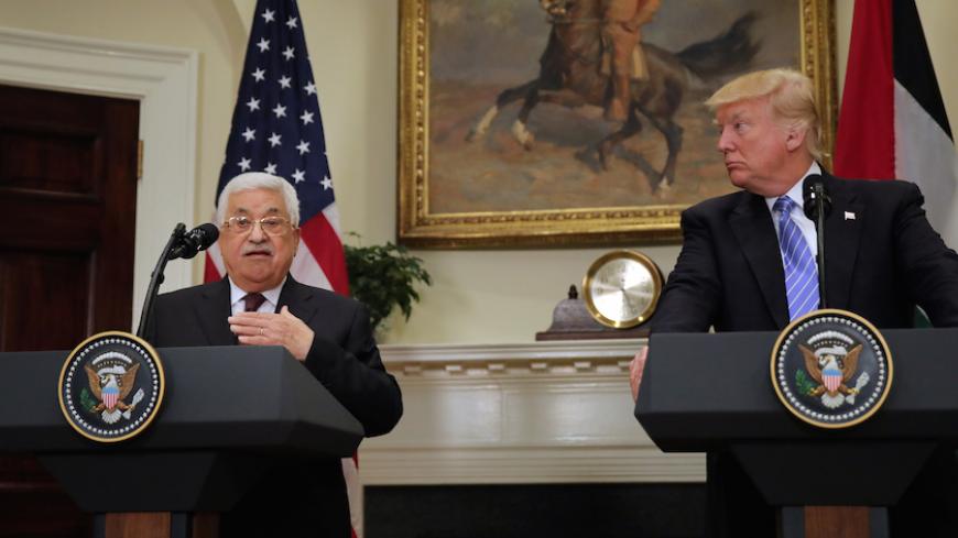 Palestinian President Mahmoud Abbas delivers a statement accompanied by U.S. President Donald Trump during a visit to the White House in Washington D.C., U.S., May 3, 2017. REUTERS/Carlos Barria - RTS14ZUF