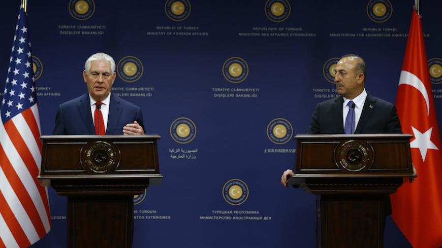U.S. Secretary of State Rex Tillerson and Turkish Foreign Minister Mevlut Cavusoglu attend a news conference in Ankara, Turkey, March 30, 2017. REUTERS/Umit Bektas - RTX33DCF