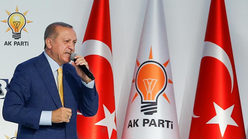 Turkish President Tayyip Erdogan makes a speech during the Extraordinary Congress of the ruling AK Party (AKP) in Ankara, Turkey, May 21, 2017. REUTERS/Murad Sezer - RTX36TBI
