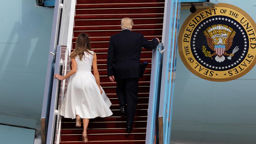 U.S. President Donald Trump and first lady Melania, board upon their departure on Air Force One at Ben Gurion International Airport in Lod near Tel Aviv, Israel May 23, 2017. REUTERS/Amir Cohen - RTX377QN