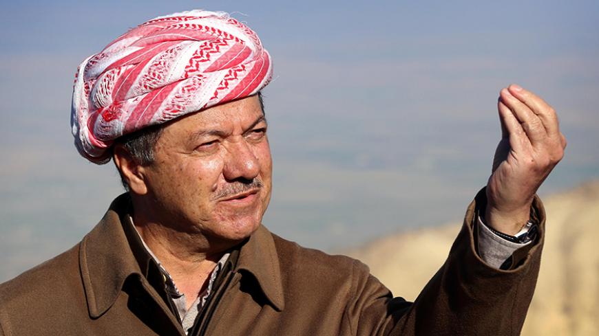 Iraqi Kurdish leader Masoud Barzani speaks to journalists on December 21, 2014 during a visit to Mount Sinjar, west of the northern Iraqi city of Mosul. Barzani hailed advances by peshmerga fighters against the Islamic State jihadist group (IS) as they battled the militants for a northern town, backed by US-led strikes.  AFP PHOTO / SAFIN HAMED        (Photo credit should read SAFIN HAMED/AFP/Getty Images)