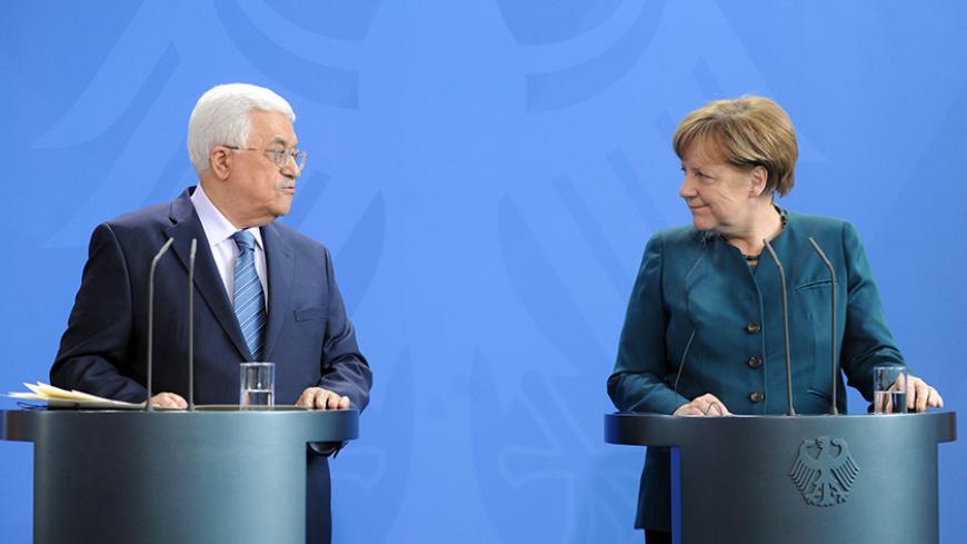 BERLIN, GERMANY - APRIL 19: In this handout image supplied by the Palestinian President's Office (PPO), Palestinian President Mahmoud Abbas attends a press conference with German Chancellor Angela Merkel on April 19, 2016 in Berlin, Germany. Abbas is meeting with Merkel as well as other European leaders and Vladimir Putin of Russia in an effort to gain support for the Mideast peace process. Abbas is next scheduled to travel to New York to attend peace talks at the United Nations.  (Photo by Thaer Ghanaim/PP