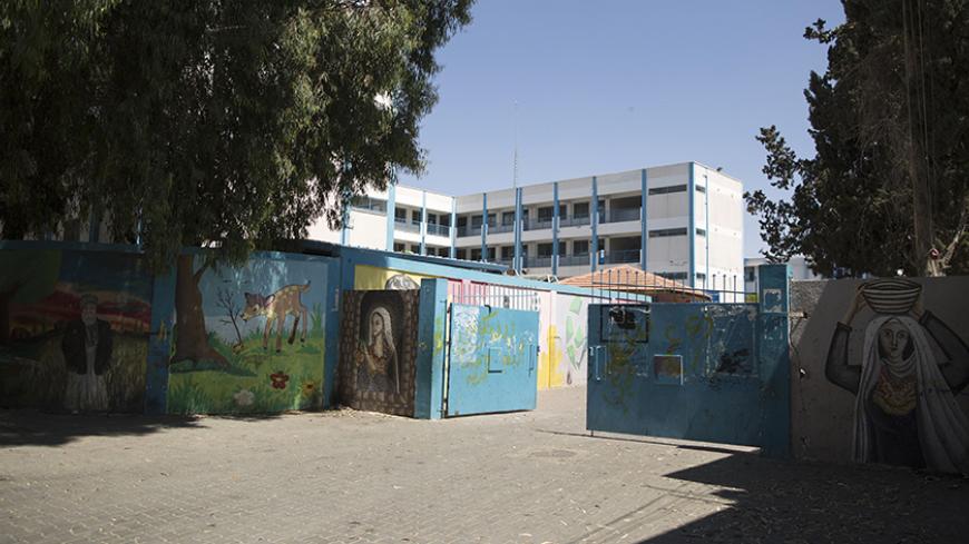 A picture taken on June 10, 2017 shows a general view of the entrance of a UN school at the al-Maghazi refugee camp, located in the centre of the Gaza Strip.
Palestinian Islamist movement Hamas has denied that it or any other militant group built a tunnel under two UN schools in Gaza after its discovery drew a strong UN protest. On June 1, the UN agency for Palestinian refugees (UNRWA) found "part of a tunnel that passes under two adjacent agency schools in the Maghazi camp" during construction work, spokes