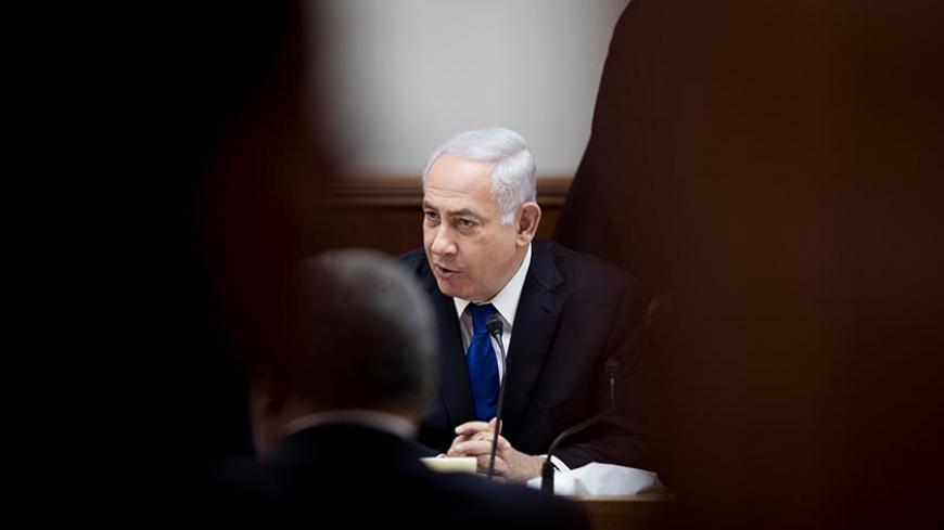 Israeli Prime Minister Benjamin Netanyahu attends the weekly cabinet meeting at his office in Jerusalem June 18, 2017. REUTERS/Abir Sultan/Pool - RTS17ITS