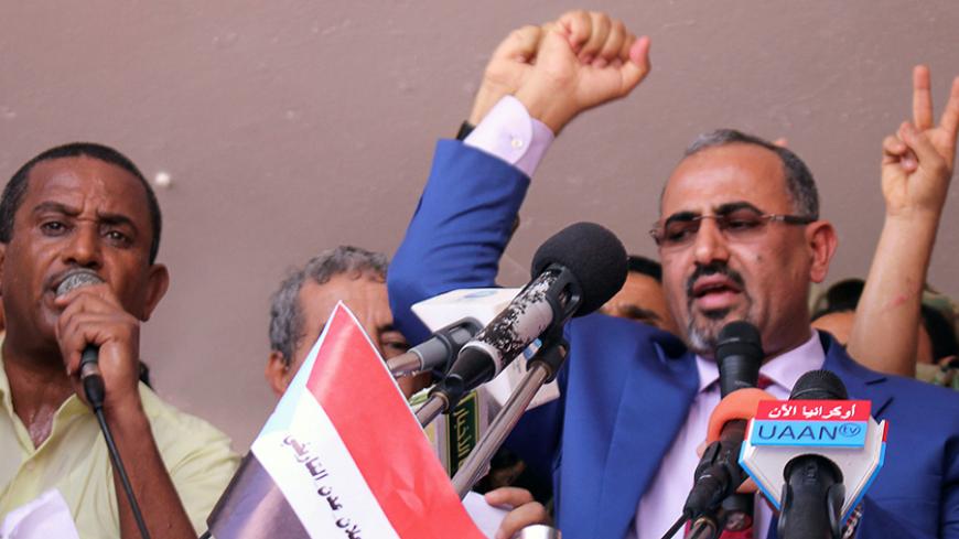 Dismissed governor of the southern Yemeni port city of Aden, Aidaroos al-Zubaidi (R), waves to  supporters of the separatist Southern Movement as they demonstrated against recent decisions by President Abd-Rabbu Mansour Hadi that sacked senior officials supported by the United Arab Emirates, including al-Zubaidi in Aden, Yemen May 4, 2017. REUTERS/Fawaz Salman - RTS154Z1