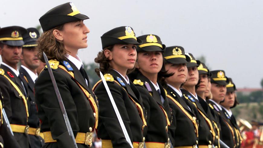 Women Turkish army officers hold their swords to salute President Ahmet
Necdet Sezer as they parade during a ceremony August 30, 2001, marking the
79th anniversary of Victory Day which is celebrated throughout the country.
Victory day marks the last and biggest attack to drive the Greek army out of
the country during the five year long Independence War after the Ottoman
empire had collapsed. Ataturk founded the Turkish republic in 1923 following
the independence war. REUTERS/Fatih Saribas

FS - RP2DRIEFZUAA