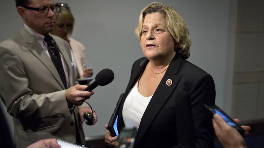 U.S. Representative Ileana Ros-Lehtinen (R-FL) speaks to the media before attending a closed meeting for members of Congress on the situation in Syria at the U.S. Capitol in Washington September 1, 2013. U.S. Secretary of State John Kerry said on Sunday tests showed that sarin nerve gas was used in a deadly August 21 chemical attack near Damascus as he sought to build the case to convince skeptical lawmakers to authorize a military strike against the Syrian government. REUTERS/Joshua Roberts    (UNITED STAT