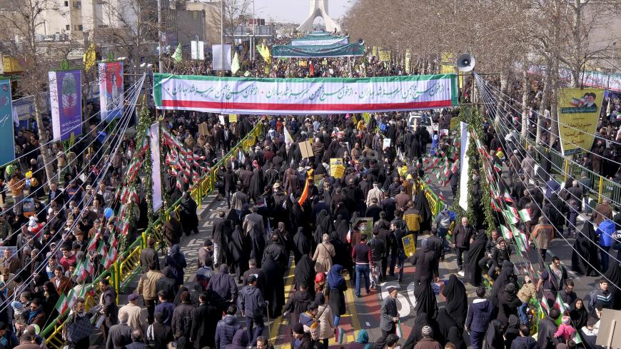 People walk during a ceremony marking the 37th anniversary of the Islamic Revolution, in Tehran February 11, 2016. REUTERS/Raheb Homavandi/TIMA  ATTENTION EDITORS - THIS IMAGE WAS PROVIDED BY A THIRD PARTY. FOR EDITORIAL USE ONLY.  - GF10000304518