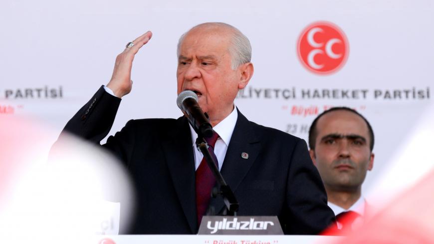 Devlet Bahceli, leader of Nationalist Movement Party (MHP), addresses his supporters during an election rally in Ankara, Turkey June 23, 2018. REUTERS/Stoyan Nenov - RC144FF5C390