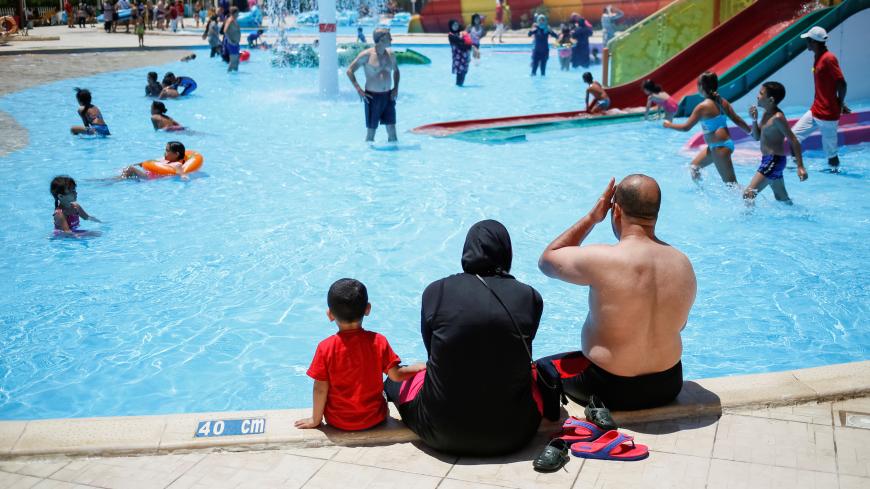 Tourists are seen at a water park in the Red Sea resort of Hurghada, Egypt, August 16, 2016.  REUTERS/Gleb Garanich - D1BETYUPRQAA