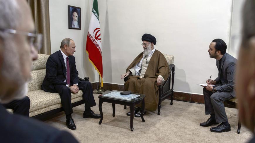 Russian President Vladimir Putin (L) meets with Iranian Supreme Leader Ayatollah Ali Khamenei (C) in Tehran, Iran November 1, 2017.  Sputnik/Dmitry Azarov/Pool via REUTERS  ATTENTION EDITORS - THIS IMAGE WAS PROVIDED BY A THIRD PARTY. - UP1EDB1169X0K