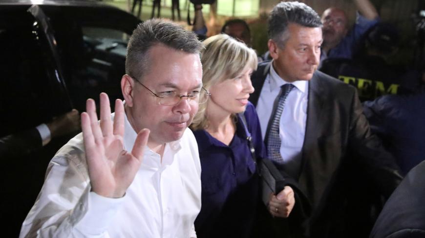 U.S. pastor Andrew Brunson and his wife Norrine arrive at the airport in Izmir, Turkey October 12, 2018. REUTERS/Umit Bektas     TPX IMAGES OF THE DAY - RC1968B6D160