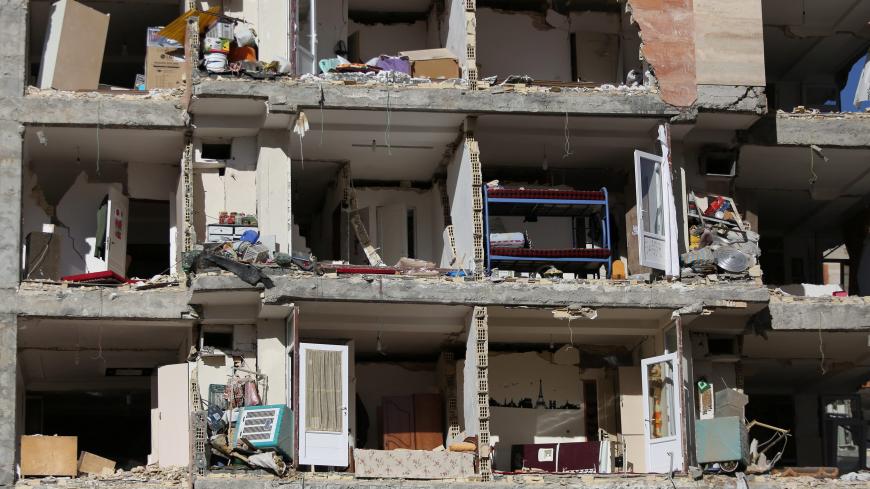 A damaged building is seen following an earthquake in Sarpol-e Zahab county in Kermanshah, Iran November 13, 2017. REUTERS/Tasnim News Agency  ATTENTION EDITORS - THIS PICTURE WAS PROVIDED BY A THIRD PARTY. - RC15640B33E0