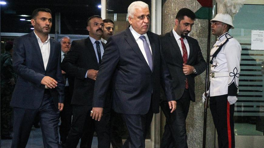 Falih al-Fayadh, Iraq's interior minister candidate arrives at parliament headquarters in the capital Baghdad on October 24, 2018, prior to a vote on the new proposed cabinet. (Photo by AHMAD AL-RUBAYE / AFP)        (Photo credit should read AHMAD AL-RUBAYE/AFP/Getty Images)