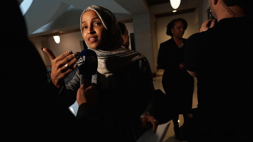 WASHINGTON, DC - JANUARY 24:   U.S. Rep. Ilhan Omar (D-MN) (L) and Rep. Ayanna Pressley (D-MA) (R) speak to members of the media after a news conference January 24, 2019 on Capitol Hill in Washington, DC. The Democratic Congresswomen held a news conference on legislation providing childcare for workers affected by the ongoing government shutdown. (Photo by Alex Wong/Getty Images)