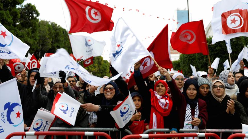 People take part in a demonstration marking the eighth anniversary of the 2011 uprising that unseated former president Zine El-Abidine Ben Ali, in Tunis, Tunisia, January 14, 2019. REUTERS/Zoubeir Souissi - RC1D517BB700