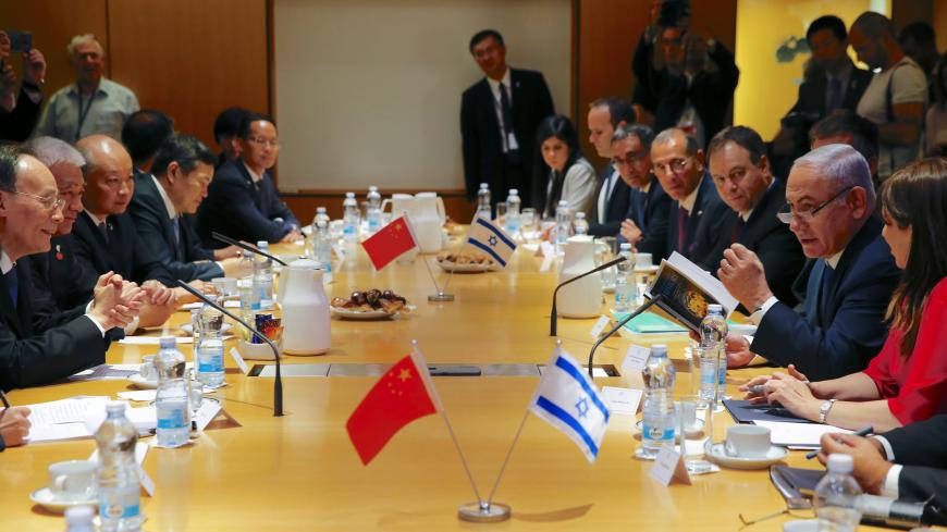 Israeli Prime Minister Benjamin Netanyahu and Chinese Vice President Wang Qishan speak during a meeting in Jerusalem October 24, 2018. Ariel Schalit/Pool via REUTERS *** Local Caption *** - RC12DD91F3B0