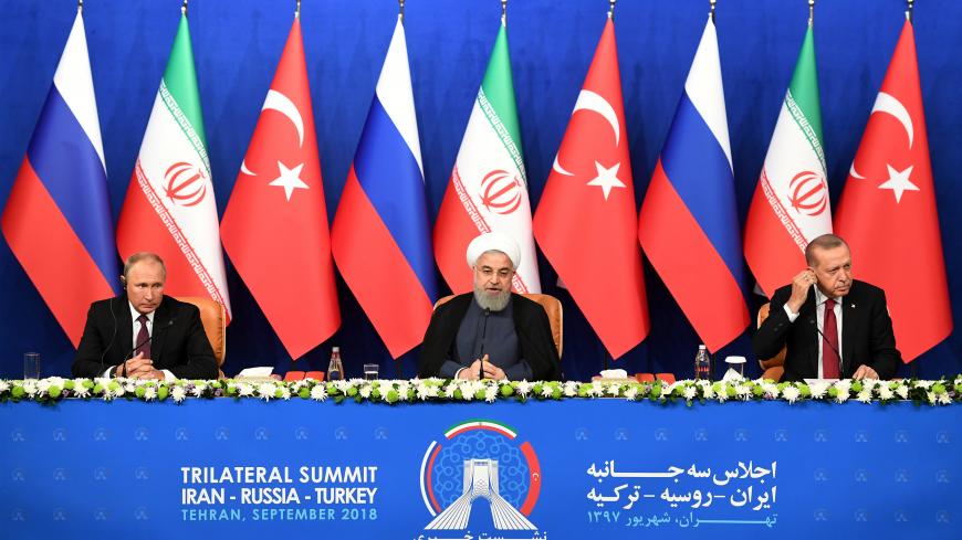President Vladimir Putin of Russia, Hassan Rouhani of Iran and Tayyip Erdogan of Turkey attend a news conference following their meeting in Tehran, Iran September 7, 2018. Kirill Kudryavtsev/Pool via REUTERS - RC14766DD6C0