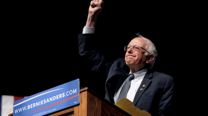 Democratic U.S. presidential candidate Bernie Sanders pumps his fist after announcing he won the Wisconsin primary at a campaign rally at the University of Wyoming  in Laramie, Wyoming April 5, 2016. REUTERS/Mark Kauzlarich      TPX IMAGES OF THE DAY      - GF10000372755