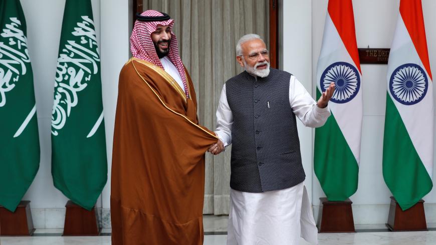 Saudi Arabia's Crown Prince Mohammed bin Salman shakes hands with India's Prime Minister Narendra Modi ahead of their meeting at Hyderabad House in New Delhi, India, February 20, 2019. REUTERS/Adnan Abidi - RC1FF5346100