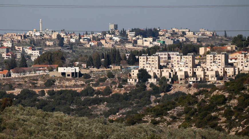 A general view taken on January 23, 2017 from the Palestinian West Bank village of Deir Estia shows the Israeli Jewish settlement of Alei Zahav (foreground) and the Palestinan village of Jinsafut (background).  / AFP / JAAFAR ASHTIYEH        (Photo credit should read JAAFAR ASHTIYEH/AFP/Getty Images)