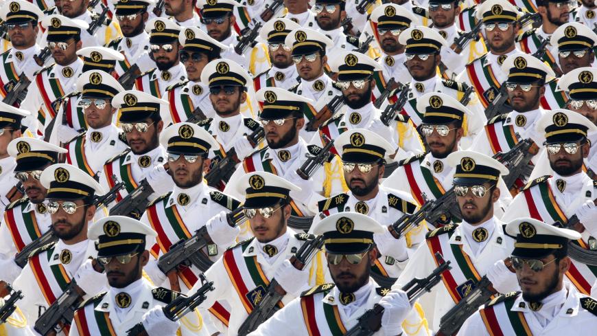 EDITORS' NOTE: Reuters and other foreign media are subject to Iranian restrictions on their ability to report, film or take pictures in Tehran. 

Members of the Iranian Revolutionary Guard Navy march during a parade to commemorate the anniversary of the Iran-Iraq war (1980-88), in Tehran September 22, 2011. REUTERS/Stringer (IRAN - Tags: POLITICS MILITARY ANNIVERSARY) - GM1E79M1DAT01