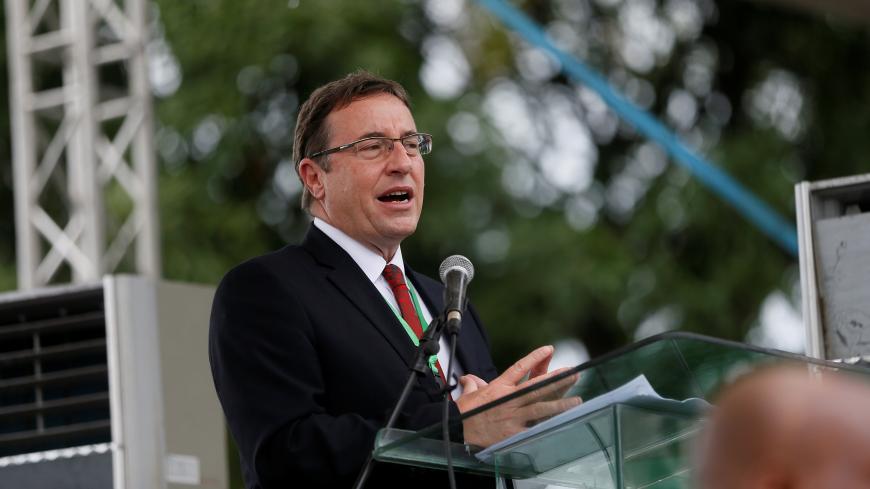 UNEP Executive Director Achim Steiner speaks in Bodo, Nigeria, during the start of an exercise to clean up pollution in Ogoni land, Nigeria June 2, 2016. REUTERS/Afolabi Sotunde - S1AETHPZCHAB