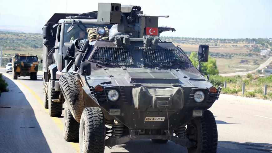 IDLIB, SYRIA - MAY 15: A military convoy of Turkish Armed Forces moves to the 12th observation point in Istabraq village near the Jisr al-Shughour in southwestern rural of Idlib, Syria on May 15, 2018, which is set up in a de-escalation zone in accordance with the Astana agreement.  (Photo by Barae el Cisir/Anadolu Agency/Getty Images)