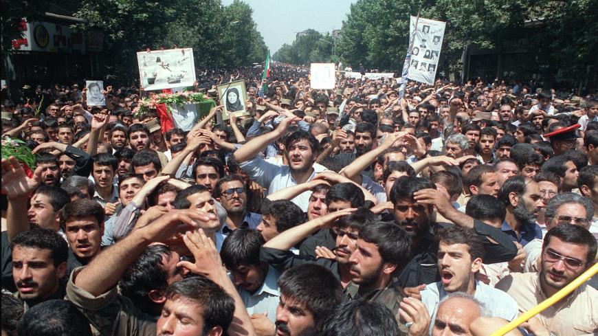 Over ten-thousand Iranians joined in carrying 72 coffins, 07 July 1988 in Tehran, during the funeral service for those who died when an Iran Air passenger jet was shot down over the Gulf by Us navy. An Iranian commercial Airbus A300, operated by Iran Air from Bandar Abbas, Iran to Dubai, UAE, was shot down by mistake over the Southern Gulf by the US navy's guided missile cruiser USS Vincennes during confrontation with Iranian speedboats, 03 July 1988. 290 civilian passengers and crew members, including 66 c
